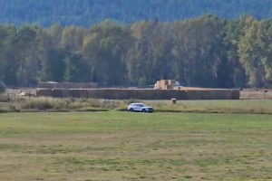 CFIA and RCMP have created a wall of hay bales around the ostriches in Edgewood.