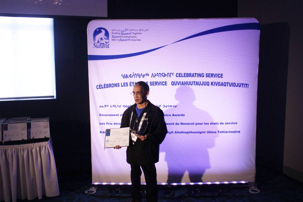 Qikiqtani School Operations employee Elijah Kaernerk received a 25-year service recognition award during a ceremony in Iqaluit on Feb. 12. William Koblensky Varela/NNSL photo